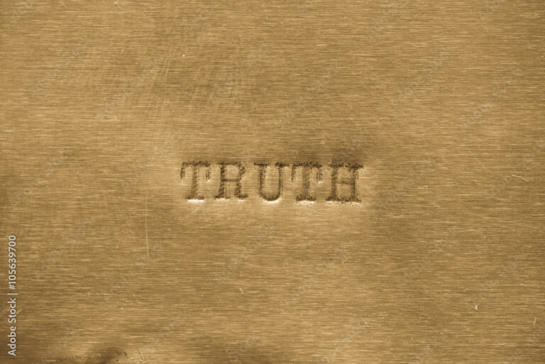 word truth printed on metallic background